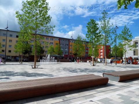 Square with trees and a fountain