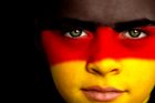 soccer fan with german flag painted on his face