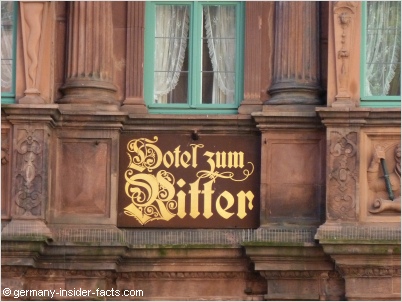red facade of hotel ritter in heidelberg
