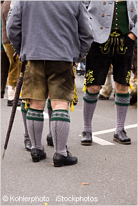 people wearing lederhosen
