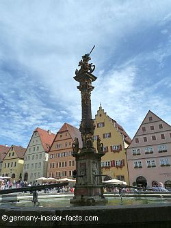 old houses and a fountain