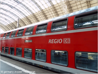 red train at a train station