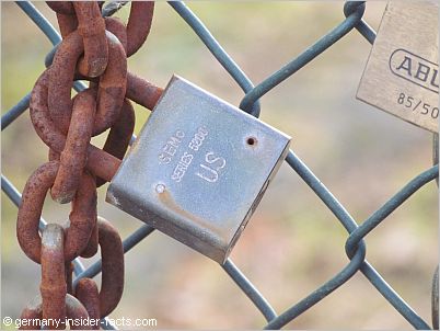 lock and chains at a fence