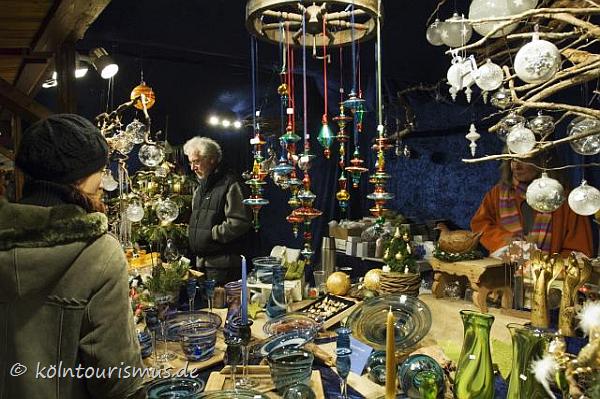 Photo of a stall with Christmas decoration at Cologne Christmas market Photo of a stall with Christmas decoration at Cologne Christmas market