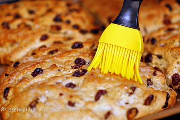 Brushing a cake with butter Brushing a cake with butter